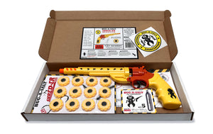 A new Bug-A-Salt SHRED-ER Kit pest control CO2 powered pistol kit in an open box, complete with donut-style shooting targets, safety glasses, and additional branding stickers.