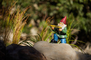 Garden Gnomes Using the Yellow Bug a salt Gun